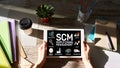 SCM - Supply Chain Management and business strategy concept on the screen Royalty Free Stock Photo