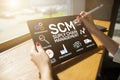 SCM - Supply Chain Management and business strategy concept on the screen Royalty Free Stock Photo