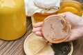 Scoby, Hand holding tea mushroom with kombucha tea, Healthy fermented food, Probiotic nutrition drink for good balance. Royalty Free Stock Photo