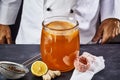 Scoby and starter liquid placed in the black tea