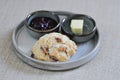 scone , cranberry scone or scone with butter and strawberry dressing