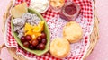 Scone, strawberry jam, almond, and mixed fruit in a basket Royalty Free Stock Photo