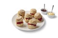 Scones with clotted cream and jam Royalty Free Stock Photo