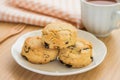 Scones on plate and cup of tea Royalty Free Stock Photo