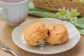 Scones on plate and cup of tea Royalty Free Stock Photo