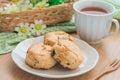 Scones on plate and cup of tea Royalty Free Stock Photo