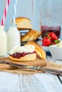 Scones with strawberry jam and clotted cream Royalty Free Stock Photo