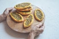 Scones with zatar. Manakish Arabic on a wooden tray. Arabic cuisine.