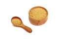 Scoop and bowl of brown cane sugar on white Royalty Free Stock Photo