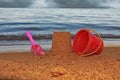 Scoop, bucket, sand figure on the beach