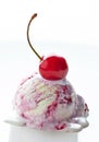 Scoop of fruit ice cream and cherry Royalty Free Stock Photo