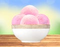 Scoop of fruit ice cream in plate on bright nature Royalty Free Stock Photo