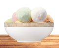 Scoop of fruit ice cream in plate on table isolated on white Royalty Free Stock Photo