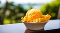 A scoop of mango sorbet in a tropical paradise