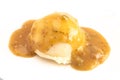 Scoop of Mashed Potatoes with Brown Meat Gravy on Top