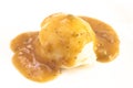 Scoop of Mashed Potatoes with Brown Meat Gravy on Top