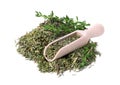 Scoop and pile of thyme isolated on white Royalty Free Stock Photo