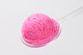 Scoop of pink ice cream on spoon Royalty Free Stock Photo