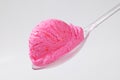 Scoop of pink ice cream on spoon Royalty Free Stock Photo