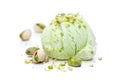 A scoop of pistachio ice cream with pistachios isolated on white background Royalty Free Stock Photo