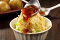 scoop of potato salad with bbq sauce drippings