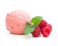 A scoop of raspberry ice cream with mint and raspberries Royalty Free Stock Photo