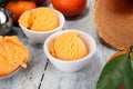 Scoop of tangarine orange ice cream. delicious icecream set Royalty Free Stock Photo