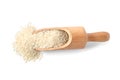 Scoop with uncooked long grain rice on white background Royalty Free Stock Photo