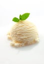 Scoop of vanilla ice-cream and mint Royalty Free Stock Photo