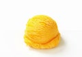 Scoop of yellow ice cream Royalty Free Stock Photo