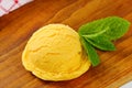 Scoop of yellow sorbet Royalty Free Stock Photo