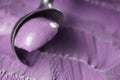 Scooping violet ice cream close up shot Royalty Free Stock Photo