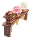 Scoops Classic Vanilla Strawberry and Chocolate Ice Cream Flavors in Sugar Cones with Sprinkles