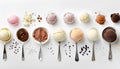Scoops of different ice creams and ingredients on white Royalty Free Stock Photo
