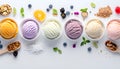 Scoops of different ice creams and ingredients on white Royalty Free Stock Photo