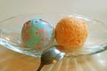 Scoops of Pastel Color Bubble Gum Ice Cream and Orange Ice Cream in a Glass Bowl Royalty Free Stock Photo