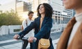 Scooter, happy and business woman with transport in the city for sustainability, clean energy and eco friendly in Canada