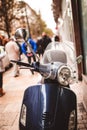 Scooter motorcycle parked in the street