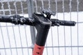 scooter steering wheel near cold frost-covered fence with icy iron rods, crystal frost, frosty morning, winter weather concept, Royalty Free Stock Photo