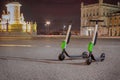 Scooters on Central Sqaure in Lisbon At Twilight