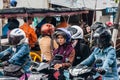 Female scooter drivers at the street stop in Yogyakarta, Indonesia