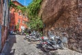 Scooters parked in a small street in Trastevere