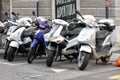 Scooters parked on the street