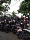 Scooters parking in the seaport of Sanur Royalty Free Stock Photo