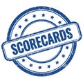 SCORECARDS text on blue grungy round rubber stamp