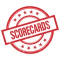 SCORECARDS text written on red vintage round stamp