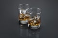 Scotch or bourbon filled glass tumblers