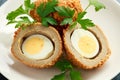 Scotch eggs on a plate with a parsley Royalty Free Stock Photo