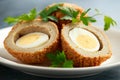 Scotch eggs on a plate with a parsley Royalty Free Stock Photo