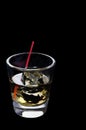 Scotch on the rocks on a black background Royalty Free Stock Photo